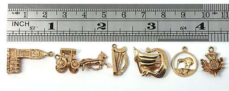 Group of 6 Gold Travel Charms