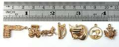 Group of 6 Gold Travel Charms
