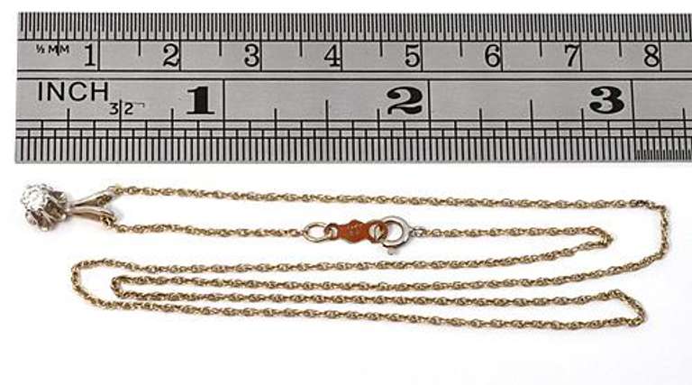Nice 1/10 Ct. Diamond Pendant & Necklace