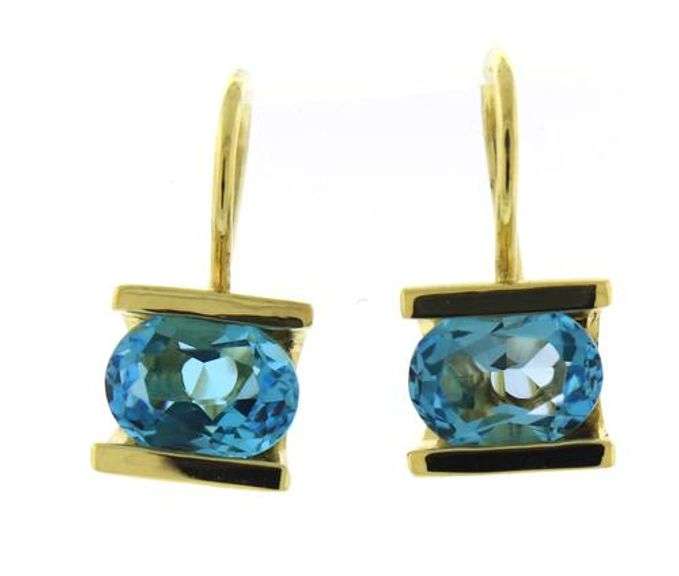 Beautiful 18kt Oval Blue Topaz Earrings