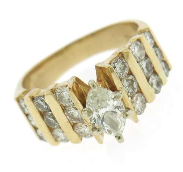 Dazzling Marquise Center w Bar Channel Diamond Band