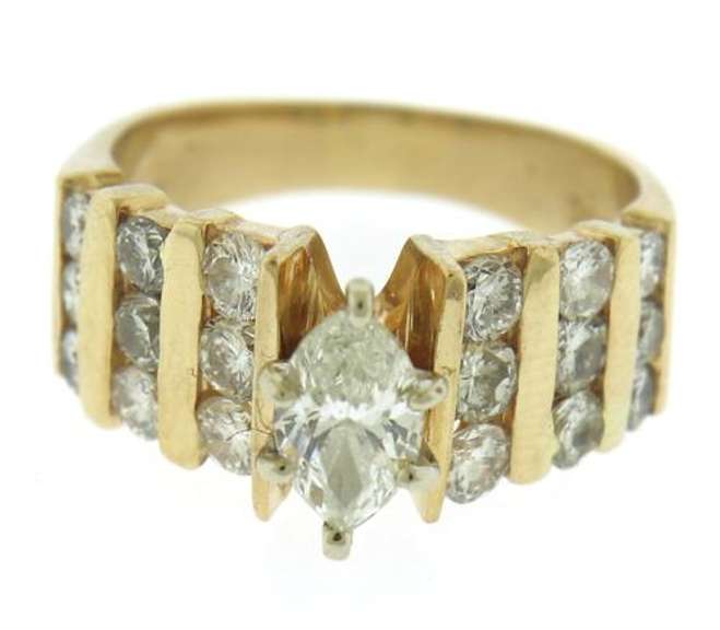 Dazzling Marquise Center w Bar Channel Diamond Band
