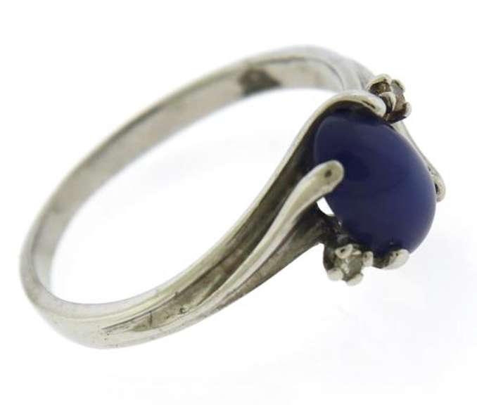 Charming Synthetic Blue Star Sapp & Diamond Accent Ring