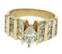 Dazzling Marquise Center w Bar Channel Diamond Band