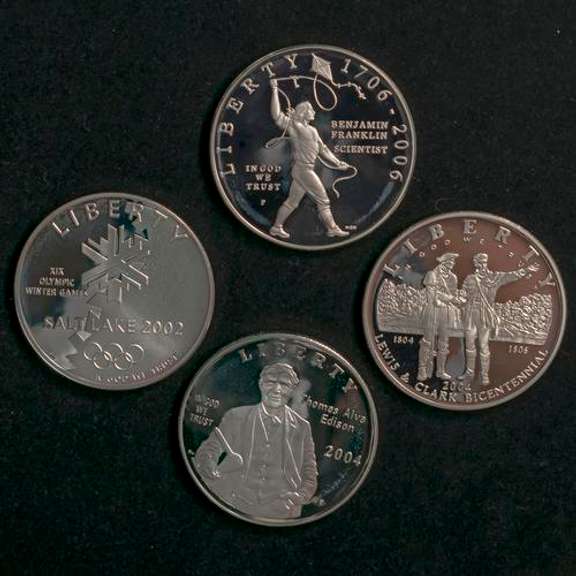 4 Modern Proof Silver Dollars In Capsules