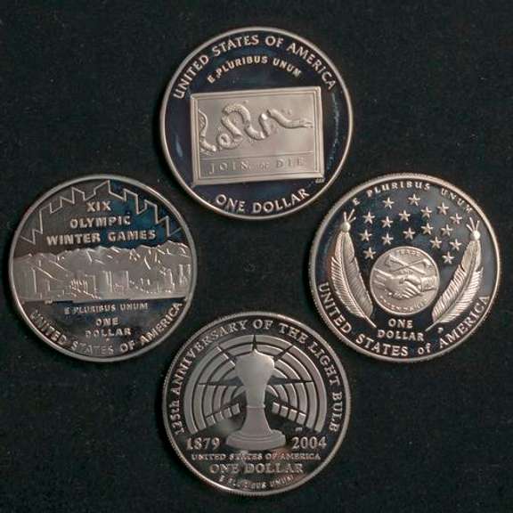 4 Modern Proof Silver Dollars In Capsules