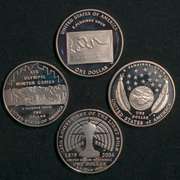 4 Modern Proof Silver Dollars In Capsules