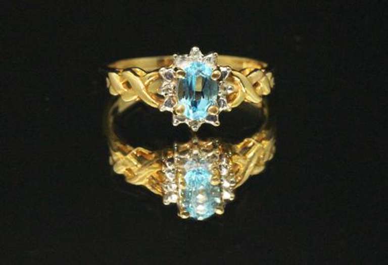 Appealing Blue Topaz & Diamond Ring in 10k