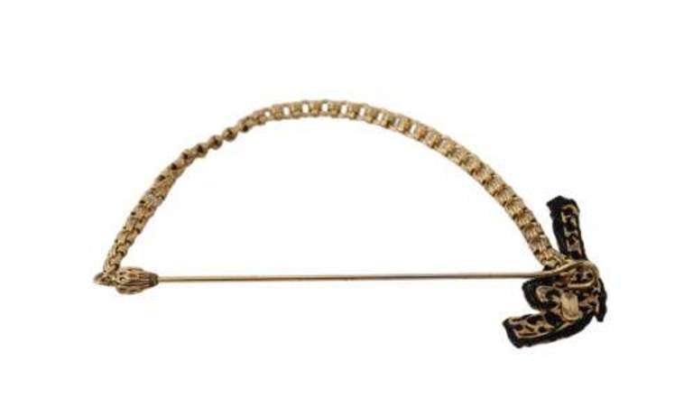 DOLCE & GABBANA LAPEL PIN OPPER REVOLVER GUN BROOCH