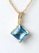 Gorgeous Blue Topaz Pendant & Chain in Yellow Gold