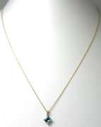 Gorgeous Blue Topaz Pendant & Chain in Yellow Gold