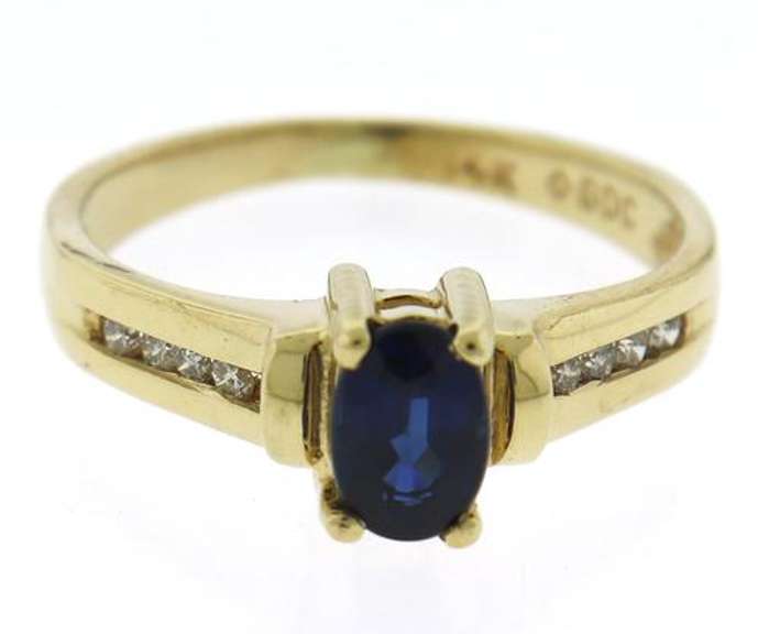 Pretty Yellow Gold Oval Sapphire & Diamond Channel Set
