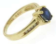 Pretty Yellow Gold Oval Sapphire & Diamond Channel Set