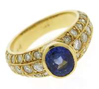 Oval Blue Sapphire and Diamond Yellow Gold Ring