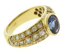 Oval Blue Sapphire and Diamond Yellow Gold Ring