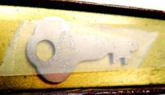 Vintage Metal Advertising Bank with Key