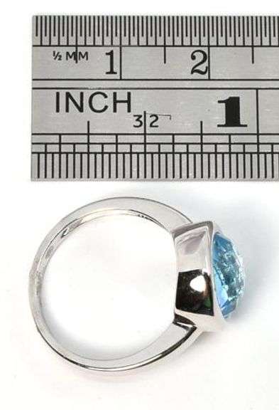 Lovely Blue Topaz Ring in 14K White Gold