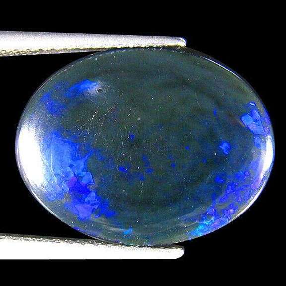 Liquid flashing 8.17ct silky black Opal