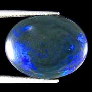 Liquid flashing 8.17ct silky black Opal
