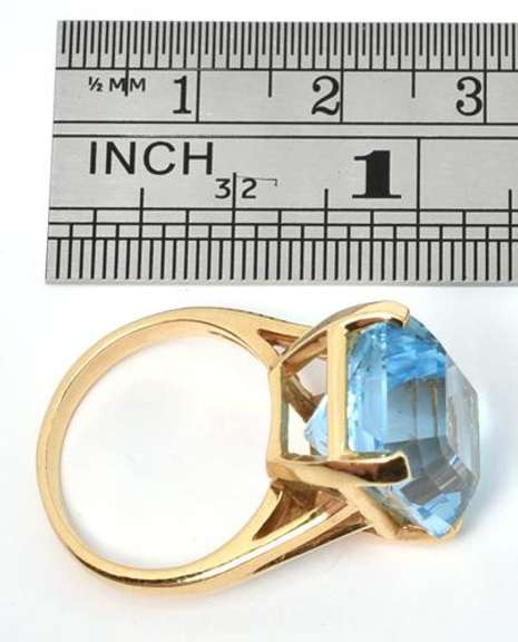 Bold and Reflective Blue Topaz Ring