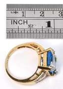 Modern Blue Topaz & Diamond Ring