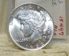 1923 Peace Dollar, almost Uncirculated, Lusterous.