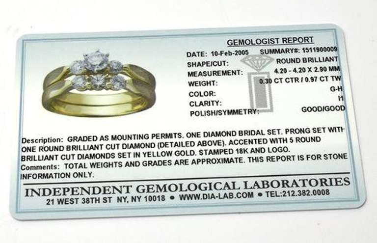 18KT & 0.97CTW Diamond Wedding Set