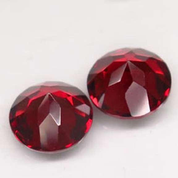 Elegant 3.17ct pair of ruby red Garnets