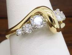 Unique Diamond & Gold Wave Ring