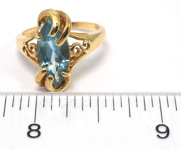 Massive Caged Blue Topaz Ring in 14KT Yellow Gold