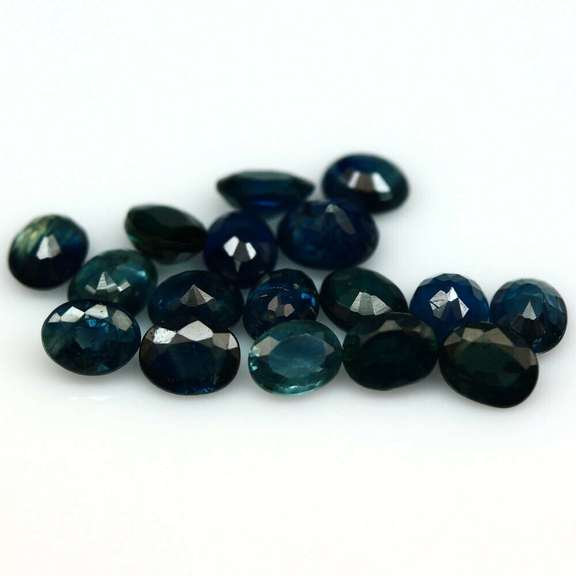 Heated only! 7.48ct deep blue sapphire set