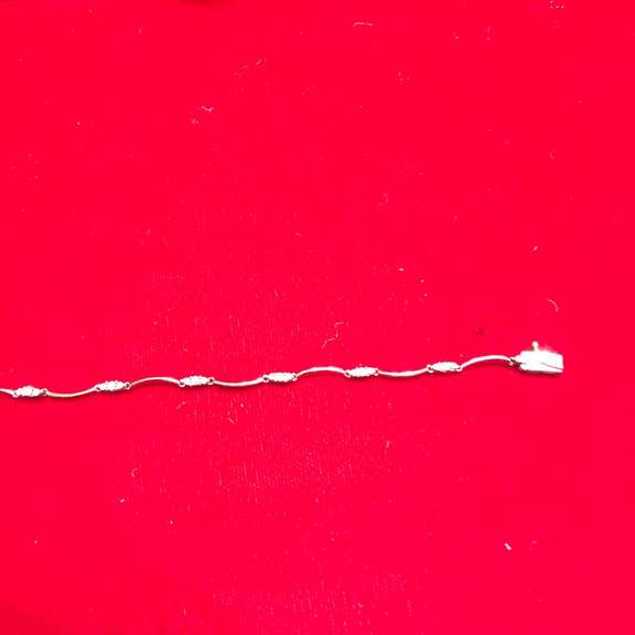 Ladies 10k white gold and diamond bracelet