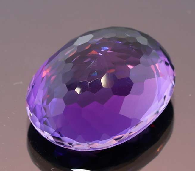 Oval cut 26.30ct royal purple created Amethyst