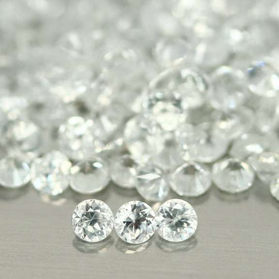 Outstanding 8.70ct diamond white Zircon set