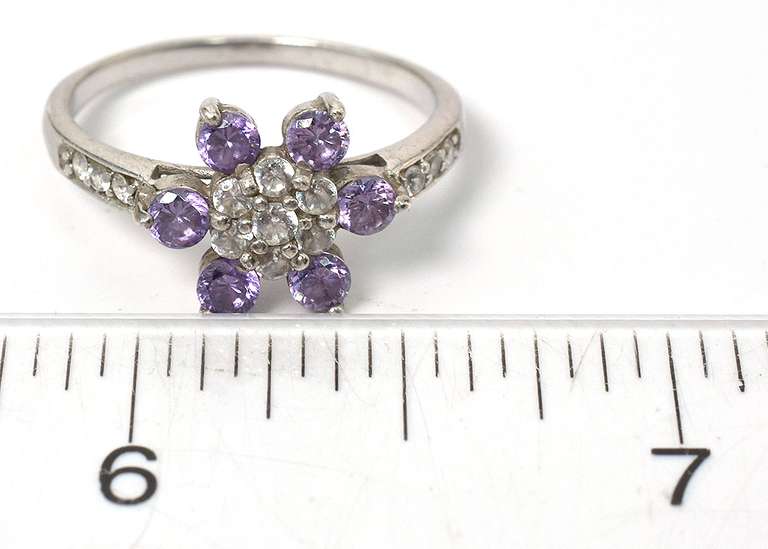 Sterling Silver Flower Ring With Purple and White Stones.