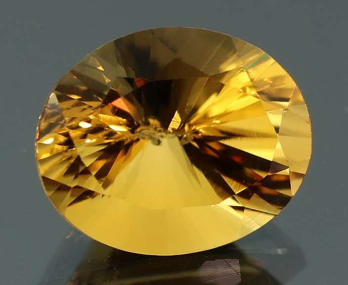 Vibrant 3.38ct 9x11mm concave cut Citrine