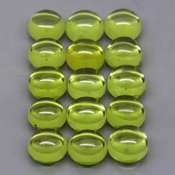 Pristine 10.16ct 15pc lime green Peridot set
