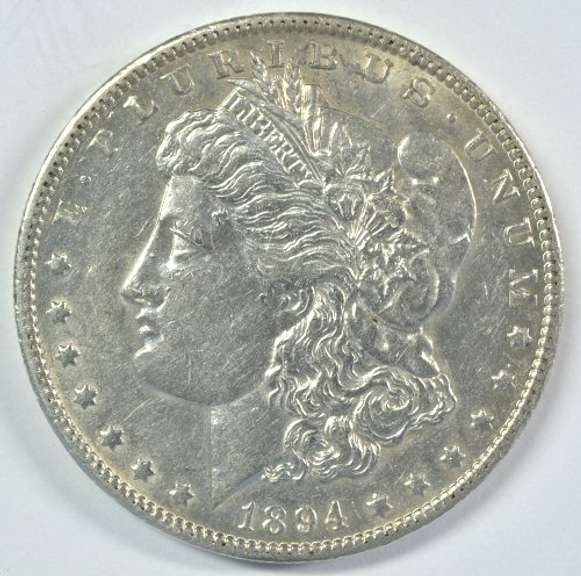 Near Mint 1894-O Morgan Silver Dollar. Lustrous AU