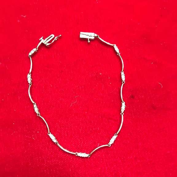 Ladies 10k white gold and diamond bracelet