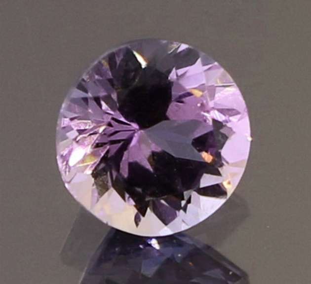 Rare! .71ct unheated real pink Tanzanite solitaire