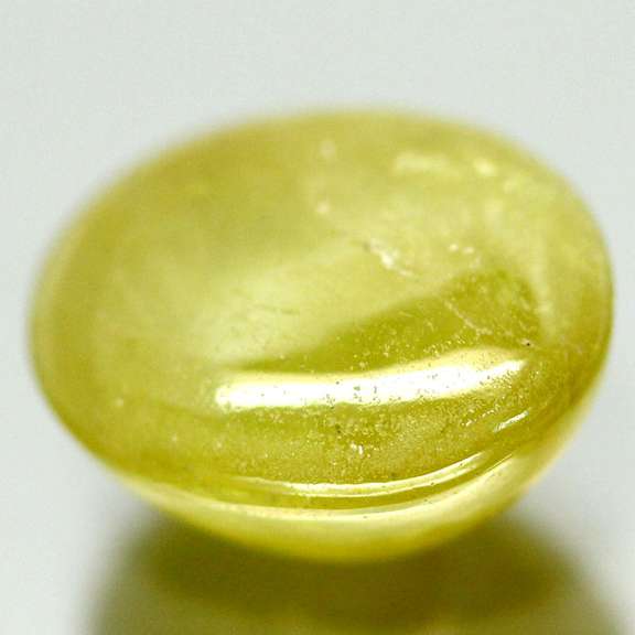 Mirror luster 11.20ct Sphene cabochon