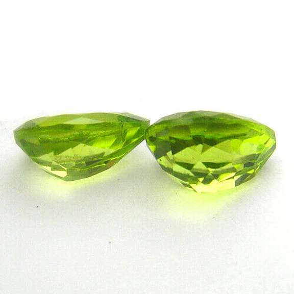 High grade 2.33ct matched Peridot set