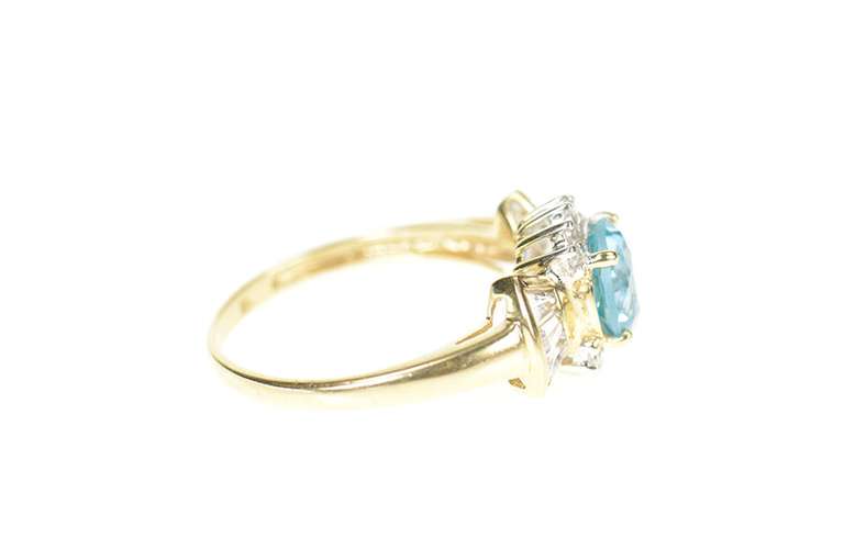 10K Yellow Gold Oval Blue Topaz Cubic Zirconia Halo Ring
