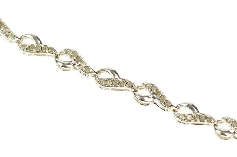 10K White Gold 1.00 Ctw Diamond Encrusted Wavy Link Tennis Bracelet