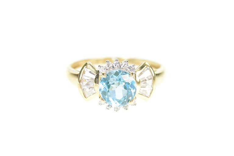 10K Yellow Gold Oval Blue Topaz Cubic Zirconia Halo Ring