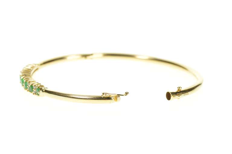 14K Yellow Gold 0.74 Ctw Emerald Diamond Inset Oval Bangle Bracelet