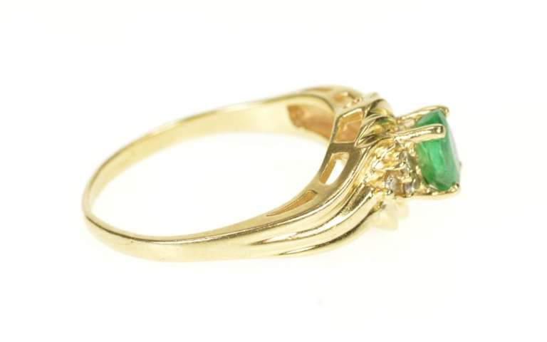 14K Yellow Gold Oval Emerald Diamond Bypass Engagement Ring