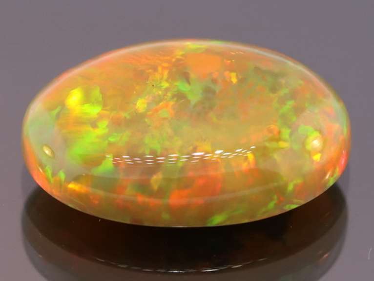 Magnificent 4.58ct full body flashing Semi Black Opal