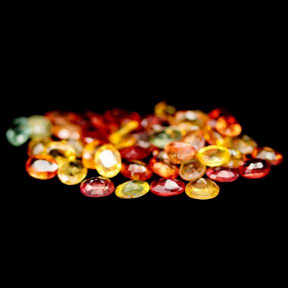 Glittering 7.90ct fancy color Sapphire set