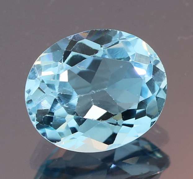 Brilliant 5.76ct oval cut Topaz center stone